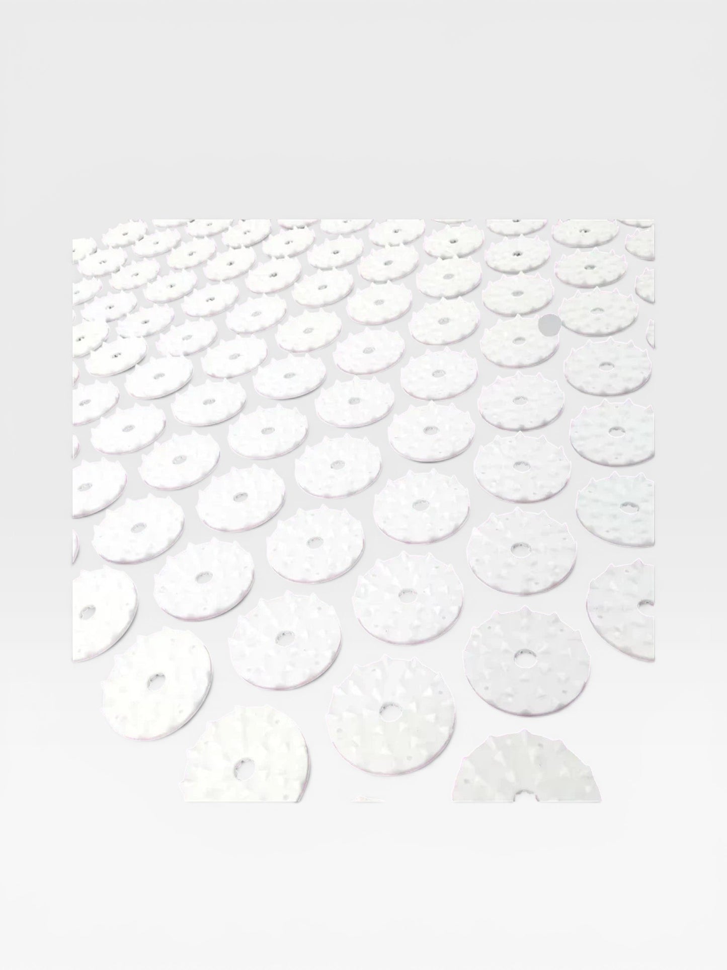 Essential Selects acupressure mat featuring white circular ABS plastic spike discs for relaxation and pain relief