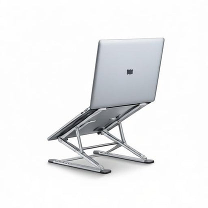 Essential Selects YYLMONE adjustable silver aluminum laptop stand holding a laptop on a white background