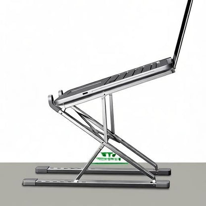 Essential Selects YYLMONE adjustable silver aluminum alloy laptop stand on a desk for ergonomic viewing