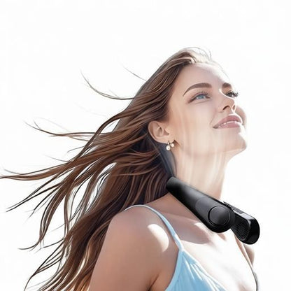 Essential Selects black bladeless portable neck fan worn by a woman with hair blowing in the breeze for cooling relief