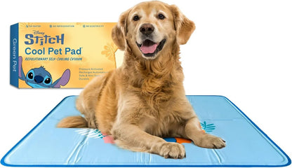 Essential Selects blue self-cooling gel pet pad with a golden retriever lying on it and its original packaging box.