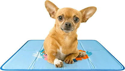 Essential Selects blue pressure-activated gel cooling pet pad with a small dog lying on it