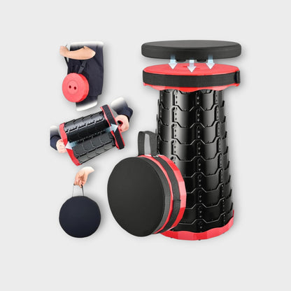 Essential Selects red and black collapsible camping stool with a detachable cushioned seat and convenient carry strap.