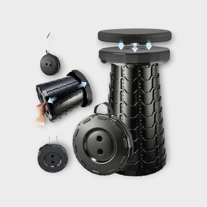 Essential Selects portable black collapsible camping stool with a detachable cushioned seat and carry strap.