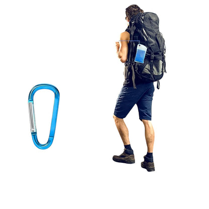 Essential Selects cooling towel in a pouch attached to a hiker's backpack with a blue carabiner at sunset.