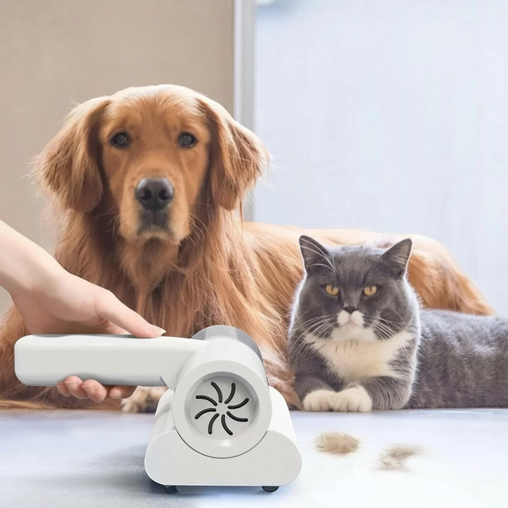 Essential Selects cordless mattress vacuum removing pet hair from fabric with a golden retriever and cat nearby
