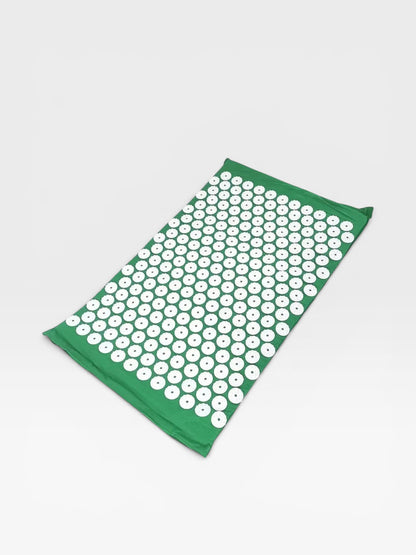 Essential Selects green acupressure mat with white ABS plastic spikes for relaxation and back pain relief