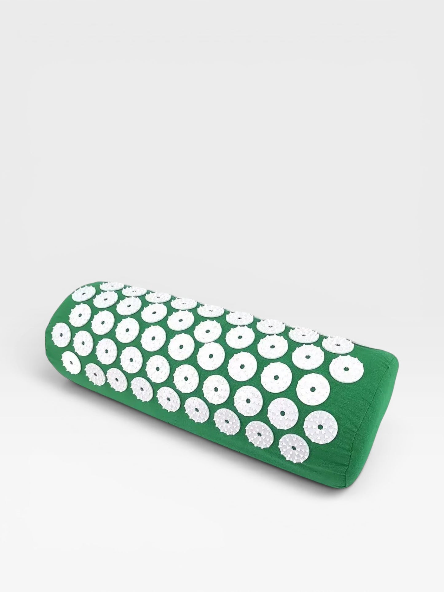 Essential Selects green acupressure pillow with white ABS plastic spikes for neck and back relaxation