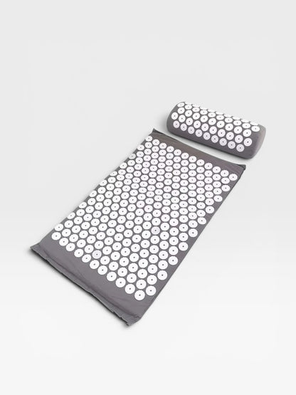 Essential Selects grey acupressure mat and pillow set with white ABS plastic spikes for relaxation and back relief