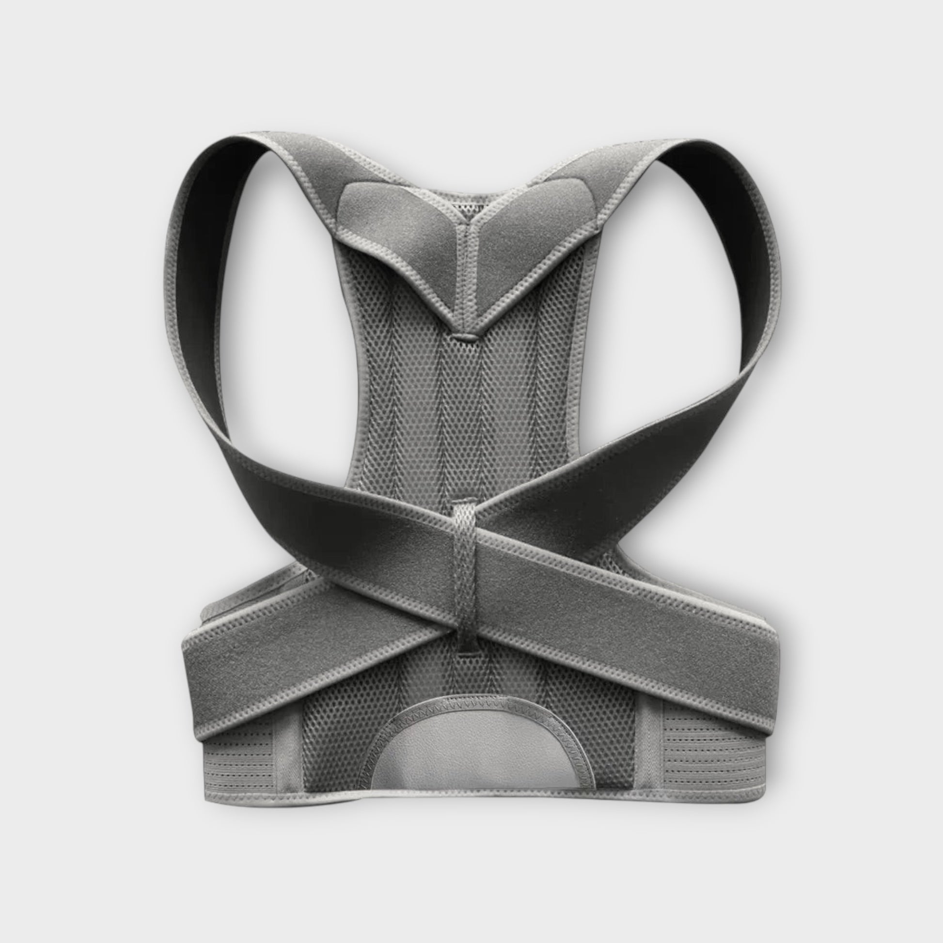 Essential Selects adjustable grey mesh back posture corrector brace with reinforced spinal support straps.