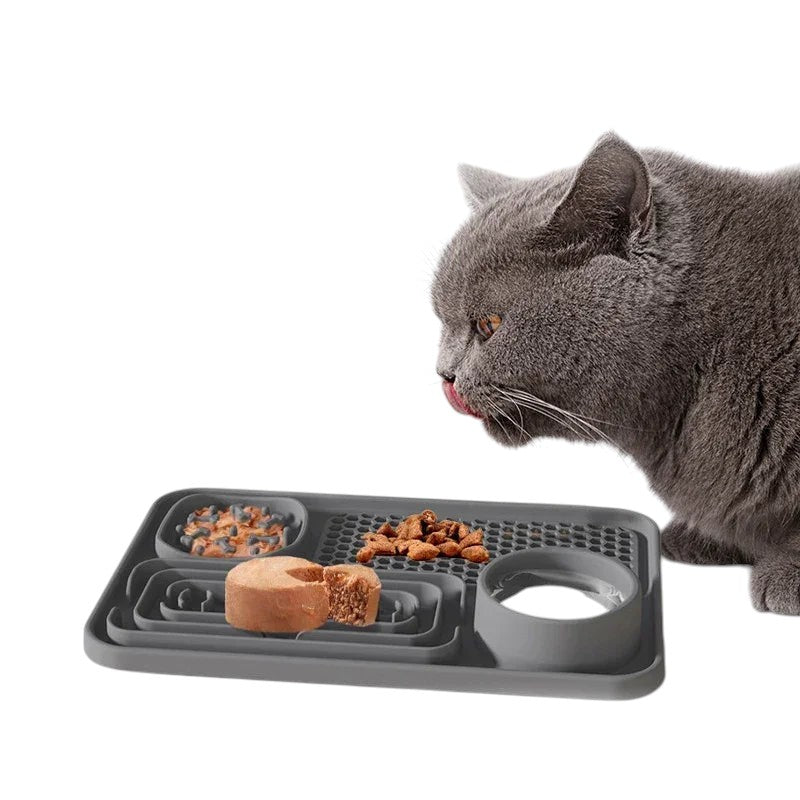Essential Selects grey silicone slow feeder pet placemat with textured compartments for food and water for a cat