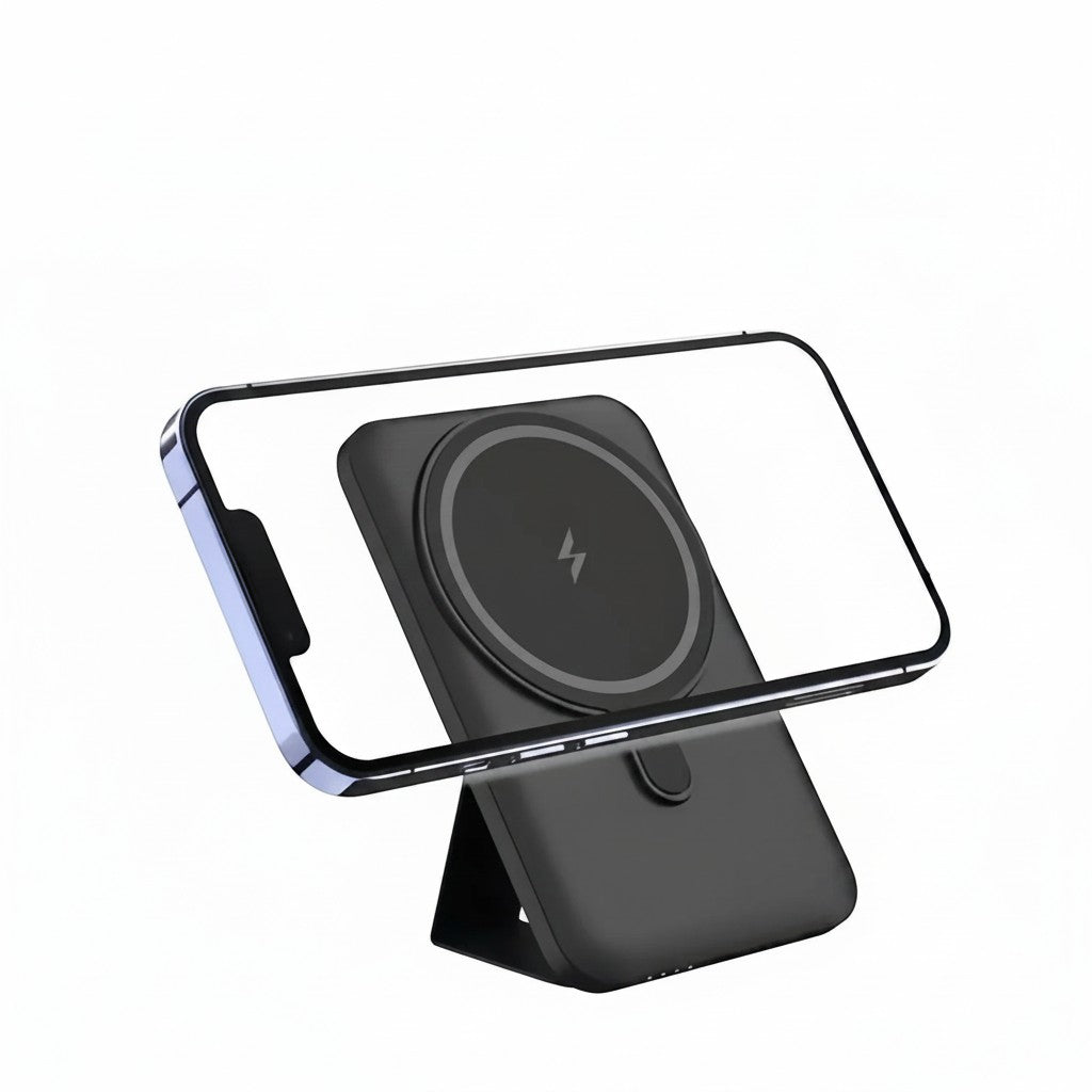 Essential Selects black magnetic wireless power bank with foldable stand attached to an iPhone for hands-free viewing