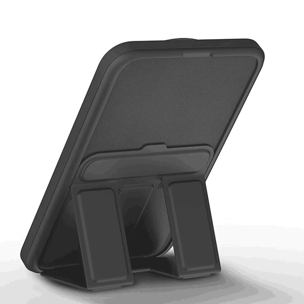 Essential Selects black magnetic wireless power bank with a foldable stand for iPhone, shown from the rear view.