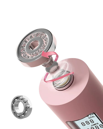 Essential Selects pink cordless jump rope handle showing the internal 360-degree ball bearing mechanism for smooth rotation