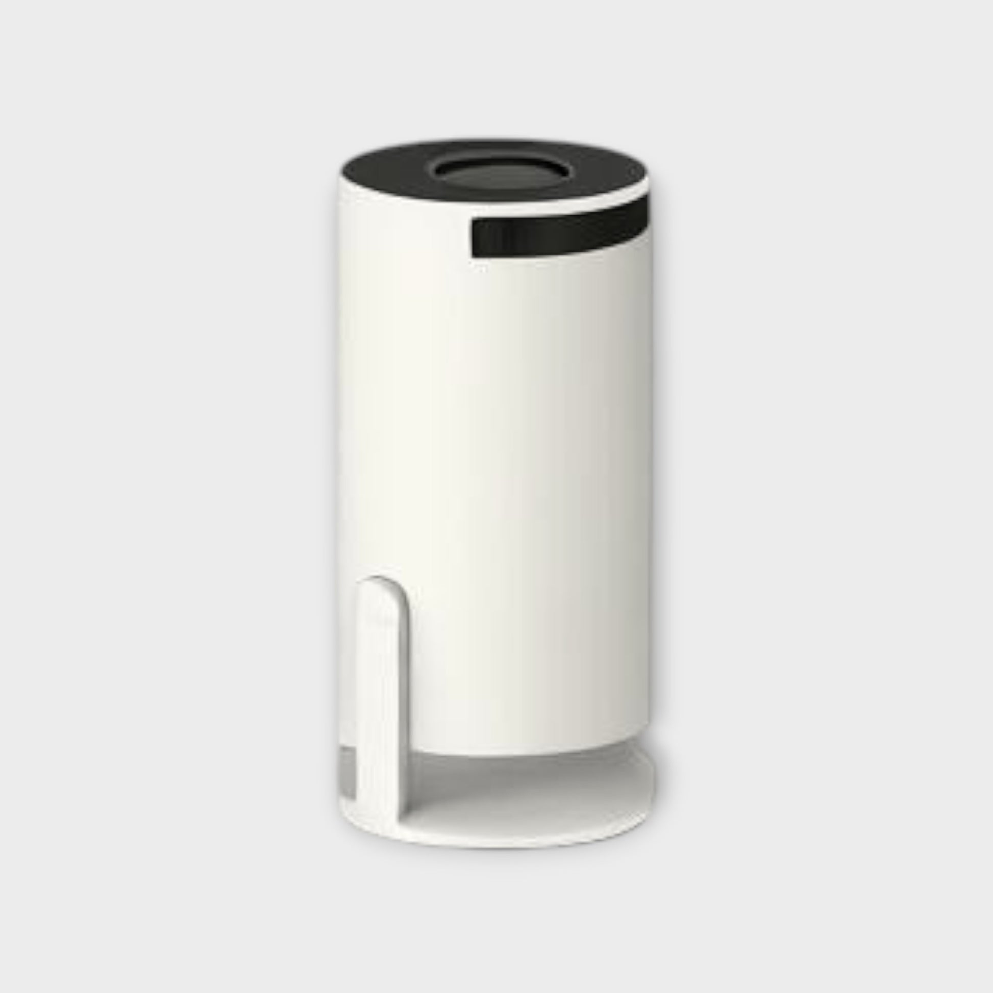 Essential Selects compact white 4K WiFi portable mini projector with a sleek cylindrical design for small spaces.