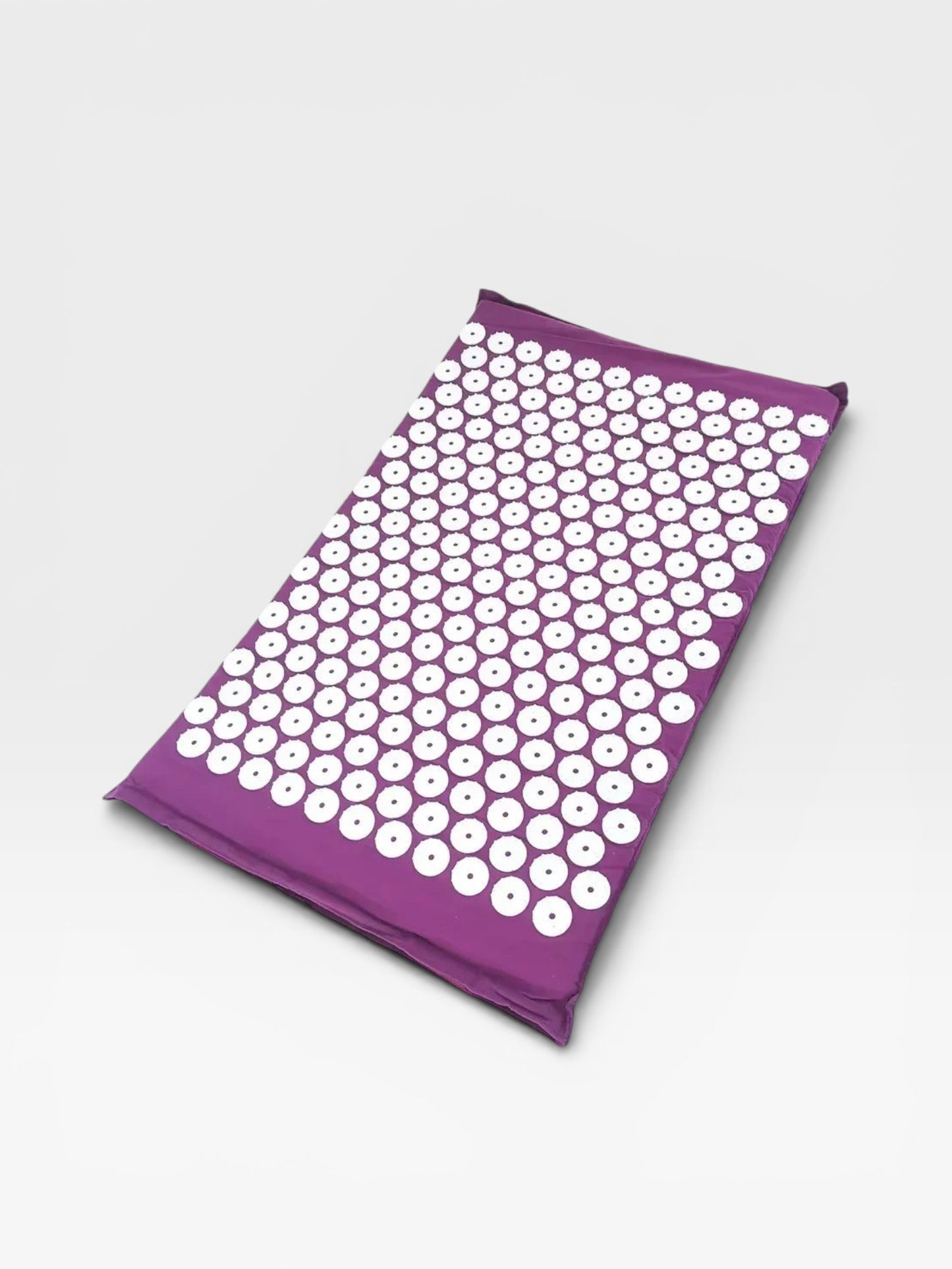 Essential Selects purple acupressure mat with white ABS plastic spikes for relaxation and back pain relief