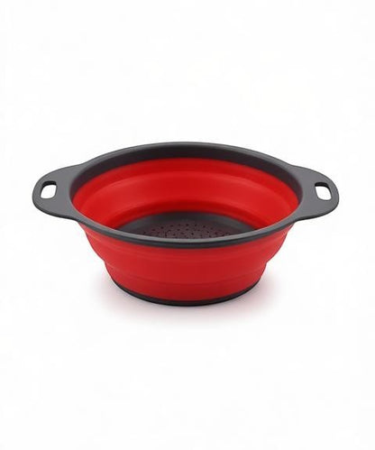 Essential Selects red silicone collapsible colander with ergonomic handles for easy kitchen food draining