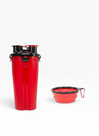 Essential Selects red portable pet travel bottle with two chambers and a matching collapsible silicone bowl