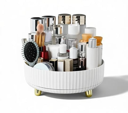 Essential Selects white rotating makeup organizer with gold feet, holding various skincare and cosmetic bottles.