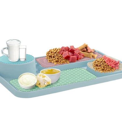 Essential Selects light blue silicone slow feeder pet placemat with various food compartments for dogs