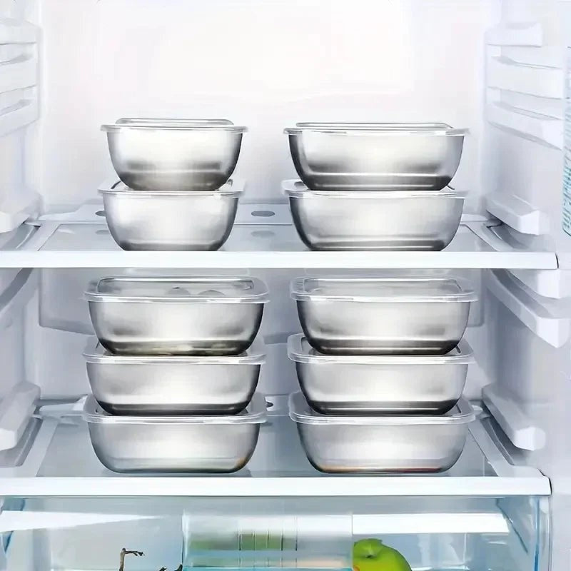 Essential Selects stainless steel stackable meal prep containers organized on refrigerator shelves