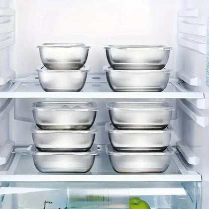 Essential Selects stainless steel stackable meal prep containers organized on refrigerator shelves