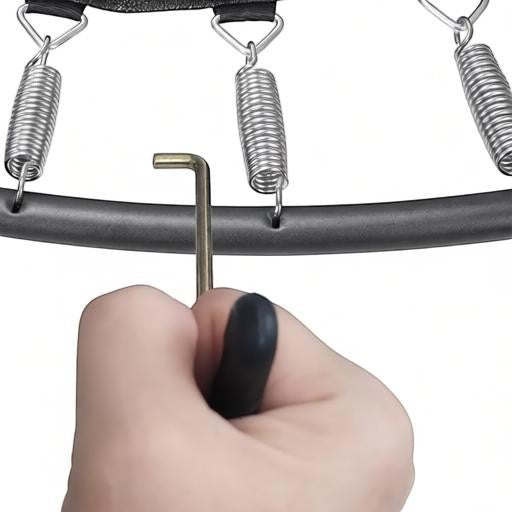 Essential Selects heavy-duty T-hook trampoline spring puller tool being used to install a metal spring on a frame.