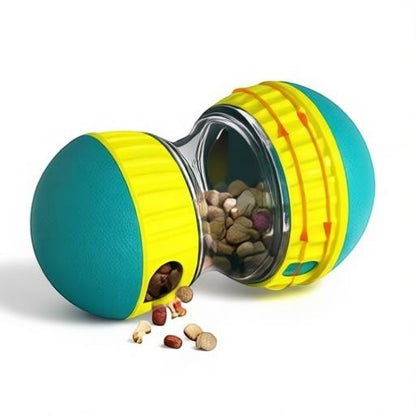Essential Selects green and yellow treat-dispensing dog puzzle toy with a transparent center for kibble storage.