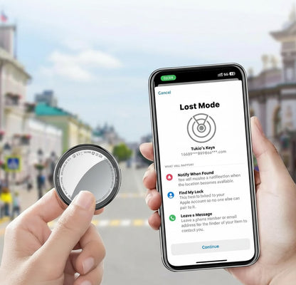 Essential Selects Tukio Bluetooth item tracker held next to a smartphone displaying the Apple Find My Lost Mode app