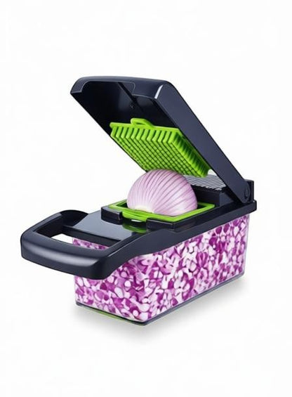 Essential Selects green and black 16-in-1 vegetable chopper with stainless steel blades and integrated food container