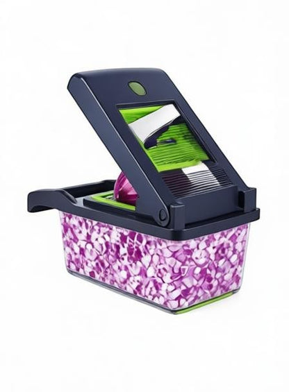 Essential Selects 16-in-1 vegetable chopper with green and black plastic frame and stainless steel blades dicing onion