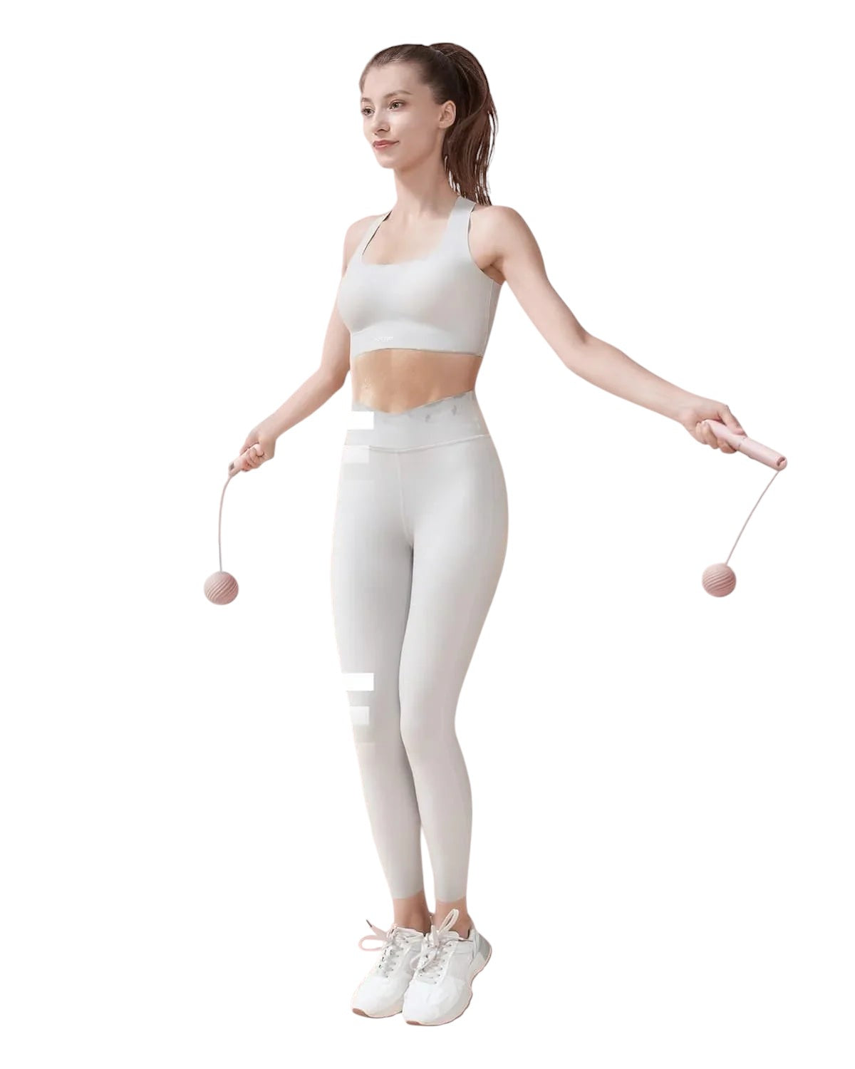 Essential Selects YOTTOY pink cordless jump rope with counter being used by a woman in athletic wear
