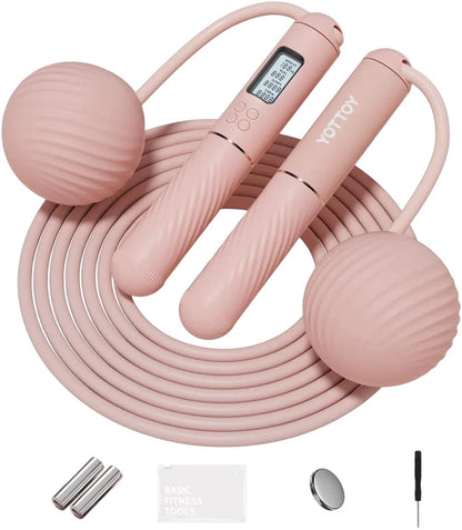 Essential Selects YOTTOY pink cordless jump rope with digital counter, silicone handles, and weighted massage balls.